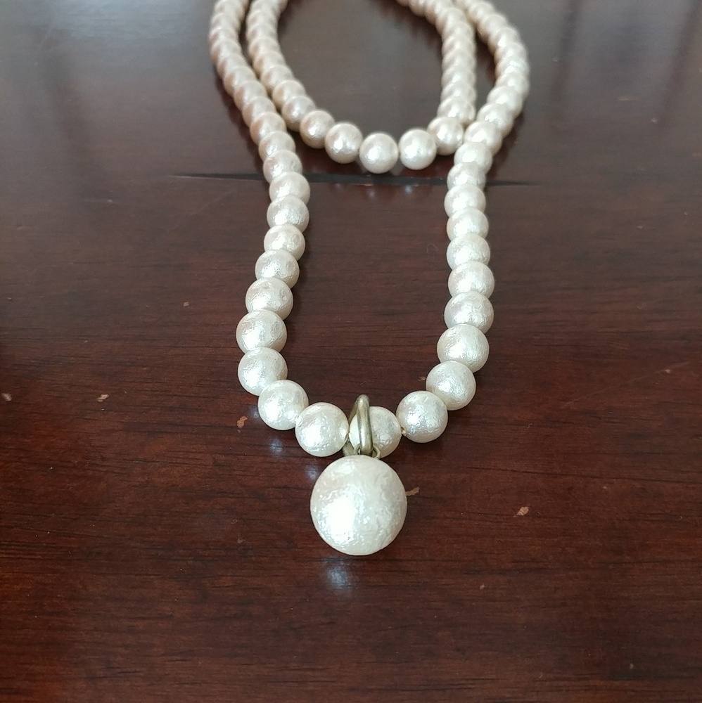 A double strand big glossy beads long necklace